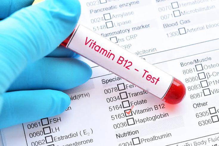 Vitamin B12 injection vial and syringe on a clean medical tray, representing energy and wellness support.
